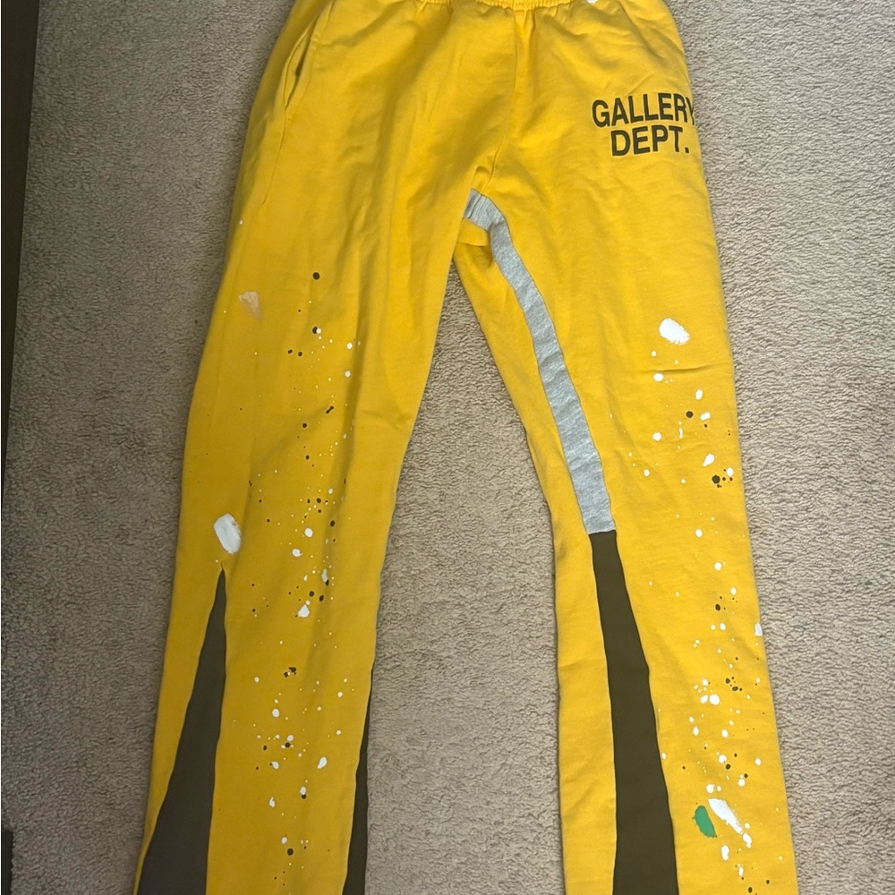 Gallery Dept. yellow pants with paint splatter